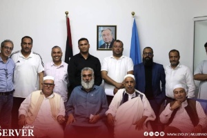 UNSMIL listens to protesters’ demands outside its headquarters in Janzour