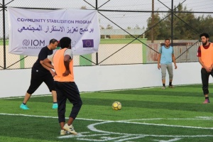 IOM hands over two football pitches to the Municipality of Kufra