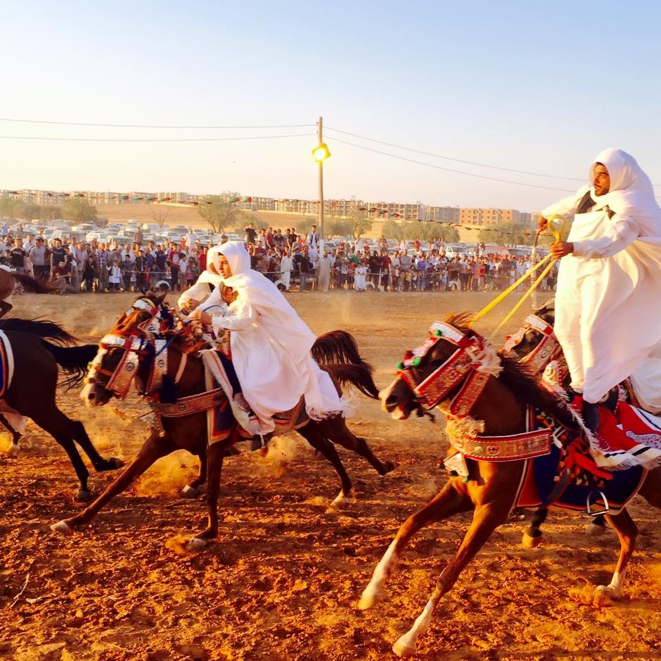 Horse riders parade in Gharyan during a traditional horse riding festival. Monday, July 20, 2015. Photos: Yousif Badairi