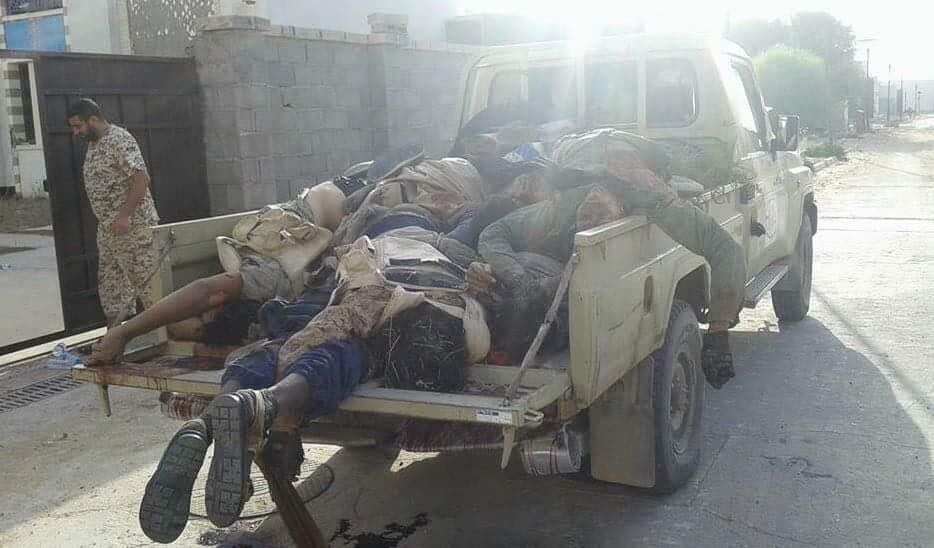Bodies of ISIS militants piled onto a pickup truck following the failed attack