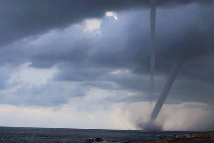 Misrata residents woke up Friday with unexpected rainy weather at the peak of summer season while waterspouts spotted off the coast 